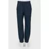 Blue pants with a pink line
