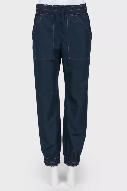 Blue pants with a pink line