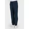 Blue pants with a pink line