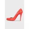 Red leather high-heeled shoes