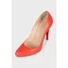 Red leather high-heeled shoes