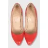 Red leather high-heeled shoes