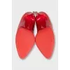 Red leather high-heeled shoes