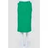 Dense green skirt with a slot
