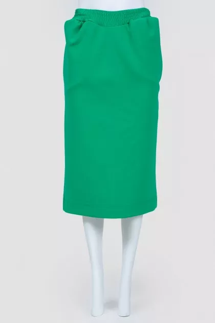 Dense green skirt with a slot