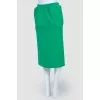 Dense green skirt with a slot