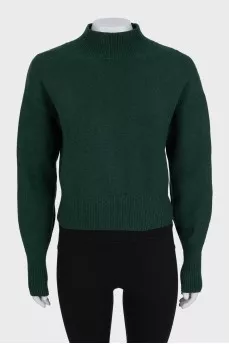 Green turtleneck jumper