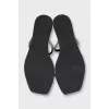 Leather flip-flops decorated with rhinestones
