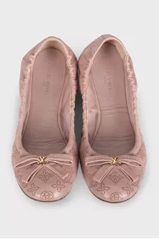Pink leather ballet flats with perforations