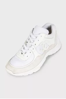 White logo-embossed sneakers