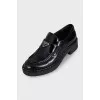 Black leather loafers with logo