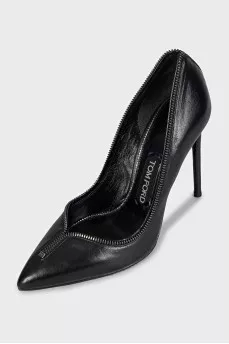 Black leather shoes decorated with a zipper