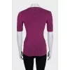 Shiny pink t-shirt with tag