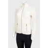 Beige knitted sweaty jacket with a neck
