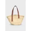 Beige raffia bag with a 3D leather logo