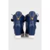 Leather wedge sneakers with embossed detailing