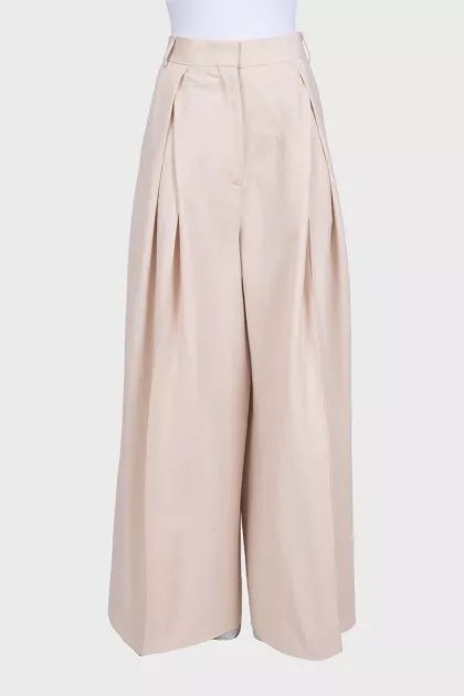 Beige wide-leg trousers with a high waist