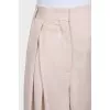 Beige wide-leg trousers with a high waist