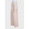 Beige wide-leg trousers with a high waist