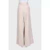 Beige wide-leg trousers with a high waist