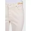 Straight-leg beige jeans with tag