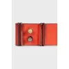 Wide orange leather belt