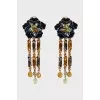 Flower-shaped clip-on earrings in gold color