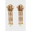 Flower-shaped clip-on earrings in gold color