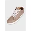 Brown leather sneakers with logo
