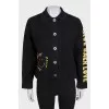 Black jacket by Sandro x Smiley