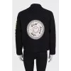 Black jacket by Sandro x Smiley