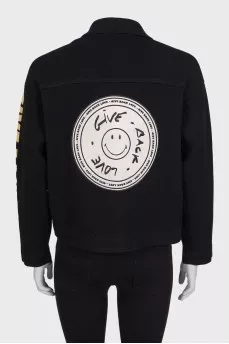 Black jacket by Sandro x Smiley