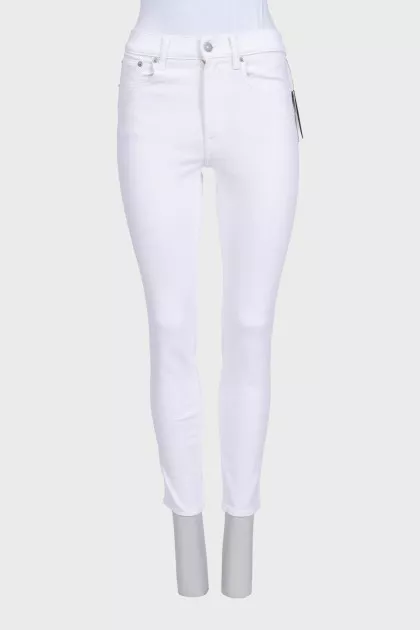 Mid-rise skinny jeans with tag