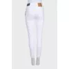 Mid-rise skinny jeans with tag