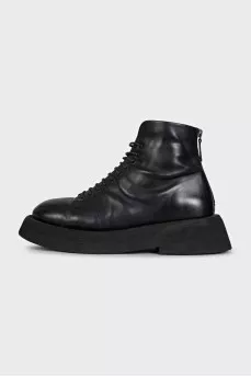 Black leather lace-up boots