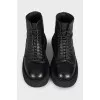 Black leather lace-up boots