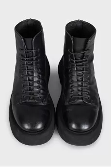 Black leather lace-up boots