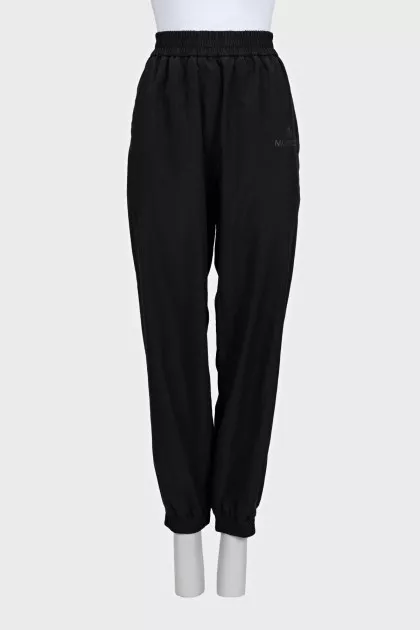 Black sports trousers with elastic waistband