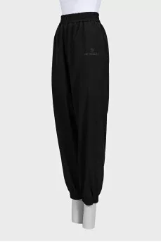 Black sports trousers with elastic waistband