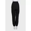 Black sports trousers with elastic waistband