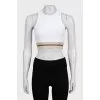 White fitted top with logo