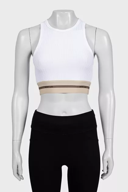 White fitted top with logo