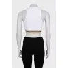 White fitted top with logo