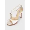White leather sandals with decor