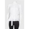 White blouse with mother-of-pearl buttons