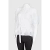 White blouse with mother-of-pearl buttons