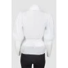 White blouse with mother-of-pearl buttons