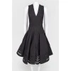 Black dress with flared skirt