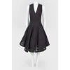 Black dress with flared skirt