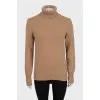 Cashmere sweater with branded patch